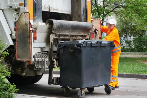 Waste removal service in action at a building site